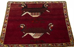 Surface texture of 2000s Shiraz rug with natural Wool and intricate pattern
