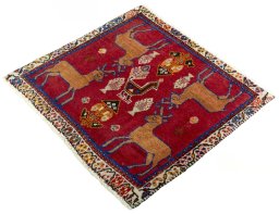 Corner detail of 2000s Shiraz rug showing border pattern and Wool pile