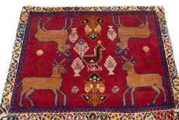Surface texture of 2000s Shiraz rug with natural Wool and intricate pattern