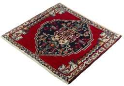 Corner detail of 2000s Shiraz rug showing border pattern and Wool pile