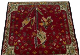 Surface texture of 2000s Shiraz rug with natural Wool and intricate pattern