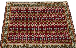 Surface texture of 2000s Shiraz rug with natural Wool and intricate pattern
