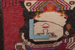 Backside of handmade 2000s Shiraz rug showing knot structure and weave density