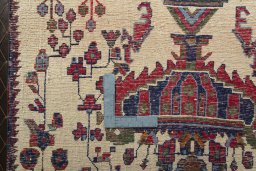 Backside of handmade 2000s Shiraz rug showing knot structure and weave density