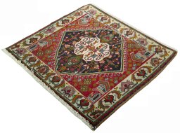 Corner detail of 2000s Shiraz rug showing border pattern and Wool pile