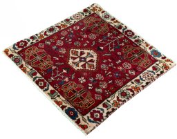 Corner detail of 2000s Shiraz rug showing border pattern and Wool pile