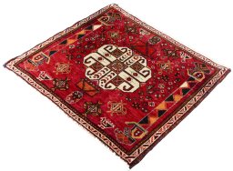 Corner detail of 2000s Shiraz rug showing border pattern and Wool pile