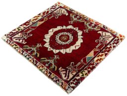 Corner detail of 2000s Shiraz rug showing border pattern and Wool pile