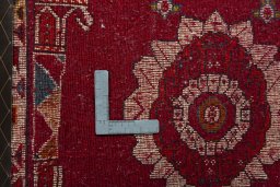 Backside of handmade 2000s Shiraz rug showing knot structure and weave density