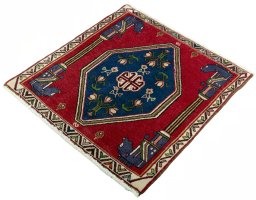 Corner detail of 2000s Shiraz rug showing border pattern and Wool pile