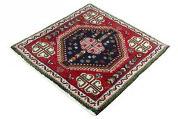 Corner detail of 2000s Shiraz rug showing border pattern and Wool pile