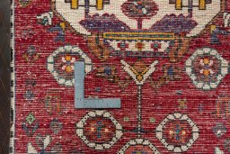 Backside of handmade 2000s Shiraz rug showing knot structure and weave density