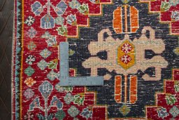 Backside of handmade 2000s Shiraz rug showing knot structure and weave density