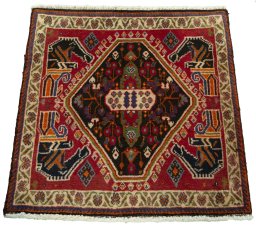 Surface texture of 2000s Shiraz rug with natural Wool and intricate pattern