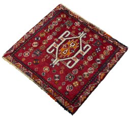 Corner detail of 2000s Shiraz rug showing border pattern and Wool pile