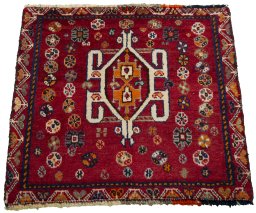 Surface texture of 2000s Shiraz rug with natural Wool and intricate pattern