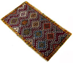 Corner detail of 2000s Shiraz rug showing border pattern and Wool pile