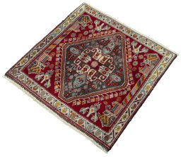 Corner detail of 2000s Shiraz rug showing border pattern and Wool pile