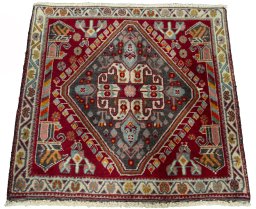 Surface texture of 2000s Shiraz rug with natural Wool and intricate pattern