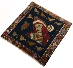Corner detail of 2000s Shiraz rug showing border pattern and Wool pile