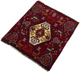 Corner detail of 2000s Shiraz rug showing border pattern and Wool pile