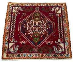 Surface texture of 2000s Shiraz rug with natural Wool and intricate pattern