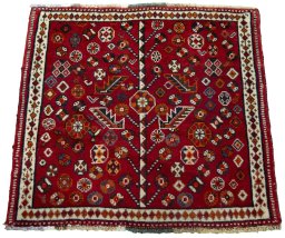 Surface texture of 2000s Shiraz rug with natural Wool and intricate pattern