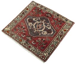 Corner detail of 2000s Shiraz rug showing border pattern and Wool pile
