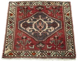 Surface texture of 2000s Shiraz rug with natural Wool and intricate pattern