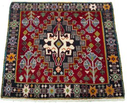 Surface texture of 2000s Shiraz rug with natural Wool and intricate pattern
