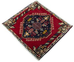 Corner detail of 2000s Shiraz rug showing border pattern and Wool pile