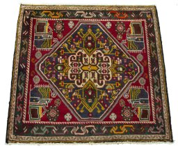 Surface texture of 2000s Shiraz rug with natural Wool and intricate pattern
