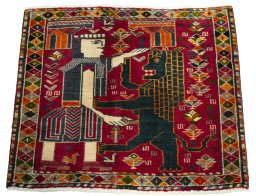 Surface texture of 2000s Shiraz rug with natural Wool and intricate pattern