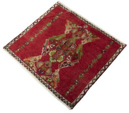 Corner detail of 2000s Shiraz rug showing border pattern and Wool pile