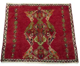 Surface texture of 2000s Shiraz rug with natural Wool and intricate pattern