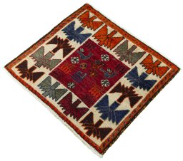 Corner detail of 2000s Shiraz rug showing border pattern and Wool pile