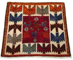 Surface texture of 2000s Shiraz rug with natural Wool and intricate pattern