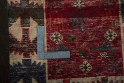 Backside of handmade 2000s Shiraz rug showing knot structure and weave density