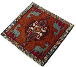 Corner detail of 2000s Shiraz rug showing border pattern and Wool pile