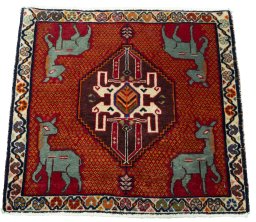 Surface texture of 2000s Shiraz rug with natural Wool and intricate pattern