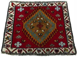 Surface texture of 2000s Shiraz rug with natural Wool and intricate pattern