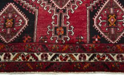 Central medallion detail of 2000s Shiraz rug from Iran / Persia