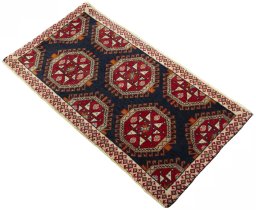 Corner detail of 2000s Shiraz rug showing border pattern and Wool pile