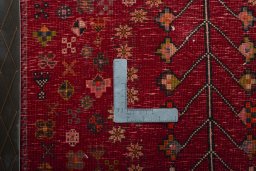 Backside of handmade 2000s Shiraz rug showing knot structure and weave density