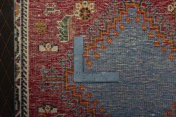 Backside of handmade 2000s Shiraz rug showing knot structure and weave density