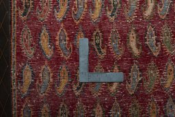 Backside of handmade 2000s Shiraz rug showing knot structure and weave density