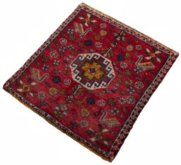Corner detail of 2000s Shiraz rug showing border pattern and Wool pile