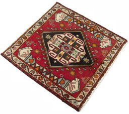 Close-up detail of 2000s Shiraz rug from Iran / Persia showing Wool weave