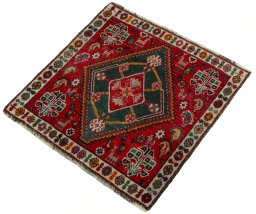 Corner detail of 2000s Shiraz rug showing border pattern and Wool pile