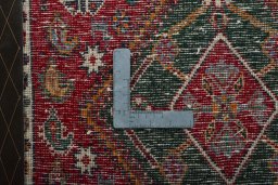 Backside of handmade 2000s Shiraz rug showing knot structure and weave density